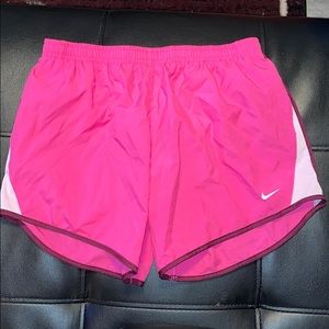 Pink Nike shorts